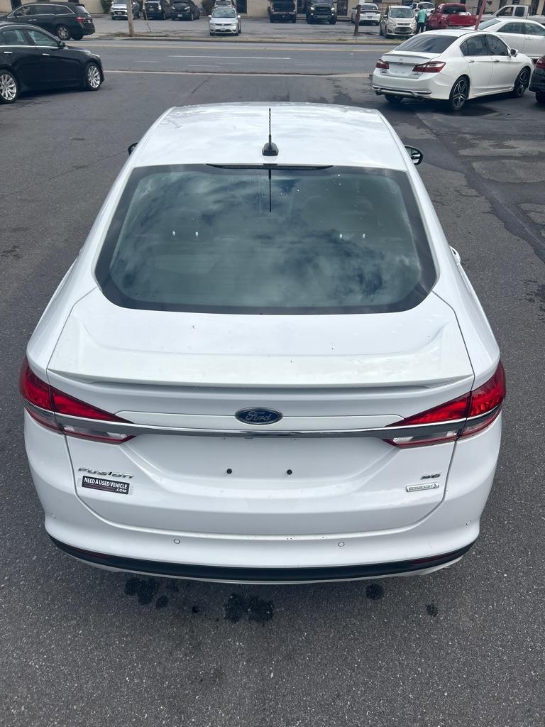 2018 WHITE FORD FUSION SE (3FA6P0HD1JR) with an 1.5L engine, Automatic transmission, located at 2514 Williamson Rd NE, Roanoke, VA, 24012, (540) 265-7770, 37.294636, -79.936249 - Photo#11