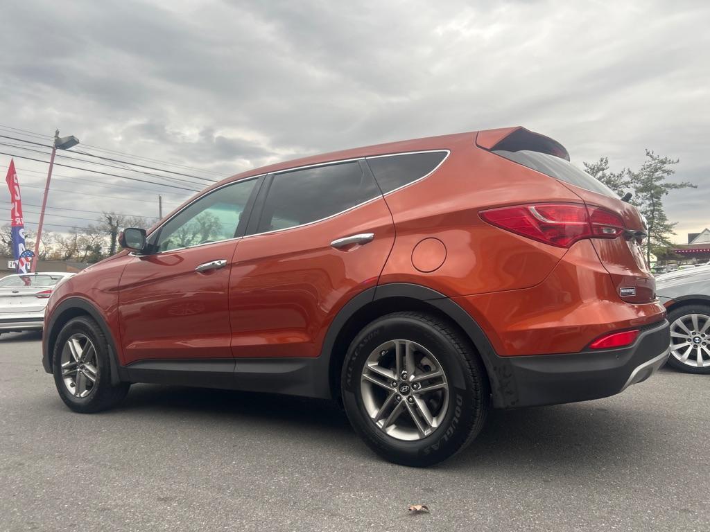 2014 ORANGE HYUNDAI SANTA FE SPORT Sport (5XYZU3LBXEG) with an 2.4L engine, Automatic transmission, located at 2514 Williamson Rd NE, Roanoke, VA, 24012, (540) 265-7770, 37.294636, -79.936249 - NO CREDIT CHECK FINANCING WITH ONLY $2800 DOWN PAYMENT!!!! Check out our website www.needausedvehicle.com for our No Credit Check/ In House Financing options!! No Credit Check Available!!! In House Financing Available!!! All Clean Title Vehicles (no Salvaged or flooded vehicles ever on our lot)! - Photo#1