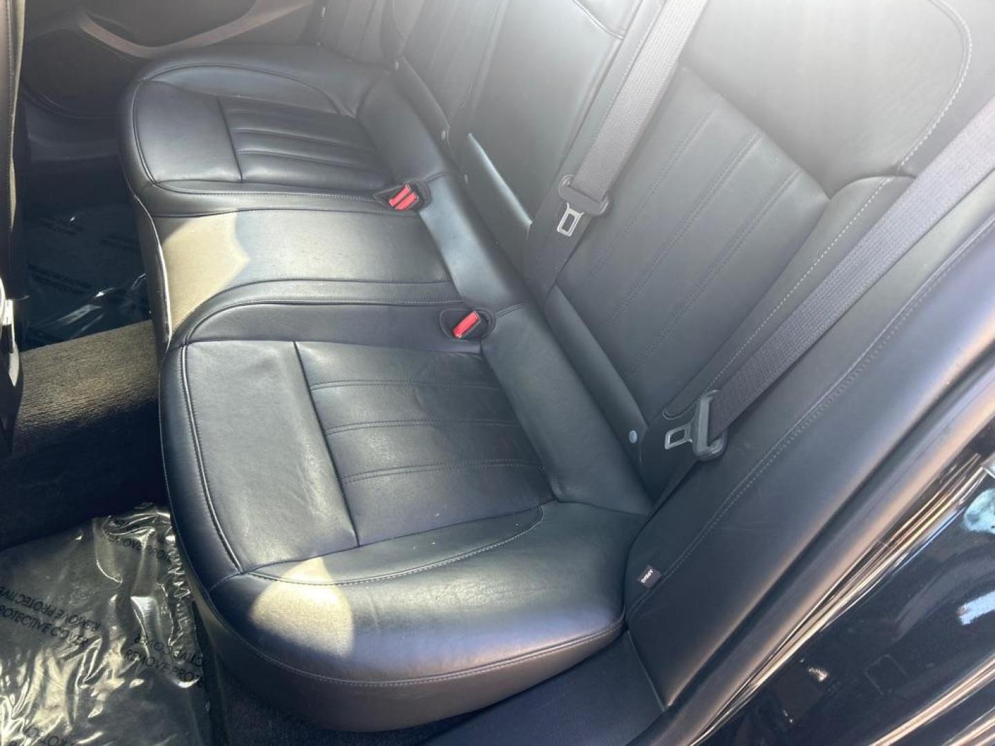 2012 BLACK BUICK REGAL PREMIUM (2G4GT5GR6C9) with an 2.4L engine, Automatic transmission, located at 2514 Williamson Rd NE, Roanoke, VA, 24012, (540) 265-7770, 37.294636, -79.936249 - Photo#4