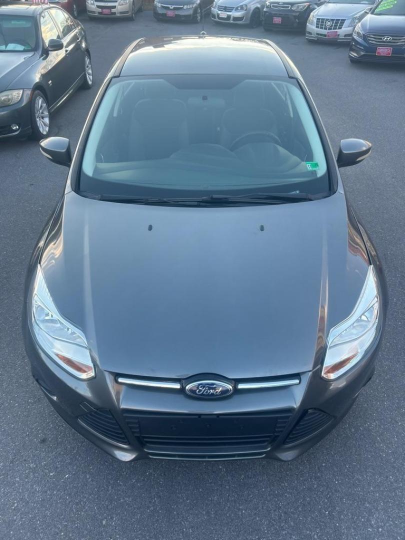 2014 GRAY FORD FOCUS SE (1FADP3F21EL) with an 2.0L engine, Automatic transmission, located at 2514 Williamson Rd NE, Roanoke, VA, 24012, (540) 265-7770, 37.294636, -79.936249 - NO CREDIT CHECK FINANCING WITH ONLY $2300 DOWN PAYMENT!!!! Check out our website www.needausedvehicle.com for our No Credit Check/ In House Financing options!! No Credit Check Available!!! In House Financing Available!!! All Clean Title Vehicles (no Salvaged or flooded vehicles ever on our lot)! - Photo#1