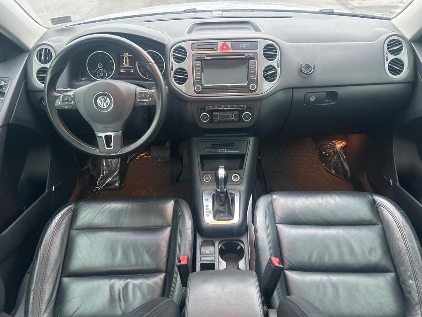 2011 GRAY VOLKSWAGEN TIGUAN S (WVGBV7AX5BW) with an 2.0L engine, Automatic transmission, located at 2514 Williamson Rd NE, Roanoke, VA, 24012, (540) 265-7770, 37.294636, -79.936249 - NO CREDIT CHECK FINANCING WITH ONLY $3200 DOWN PAYMENT!!!! Check out our website www.needausedvehicle.com for our No Credit Check/ In House Financing options!! No Credit Check Available!!! In House Financing Available!!! All Clean Title Vehicles (no Salvaged or flooded vehicles ever on our lot)! - Photo#5