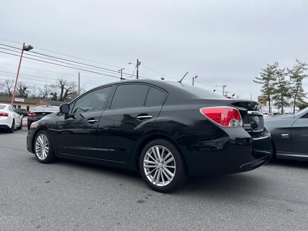 2012 BLACK SUBARU IMPREZA LIMITED (JF1GJAG67CH) with an 2.0L engine, Continuously Variable transmission, located at 2514 Williamson Rd NE, Roanoke, VA, 24012, (540) 265-7770, 37.294636, -79.936249 - NO CREDIT CHECK FINANCING WITH ONLY $2200 DOWN PAYMENT!!!! Check out our website www.needausedvehicle.com for our No Credit Check/ In House Financing options!! No Credit Check Available!!! In House Financing Available!!! All Clean Title Vehicles (no Salvaged or flooded vehicles ever on our lot)! - Photo#1