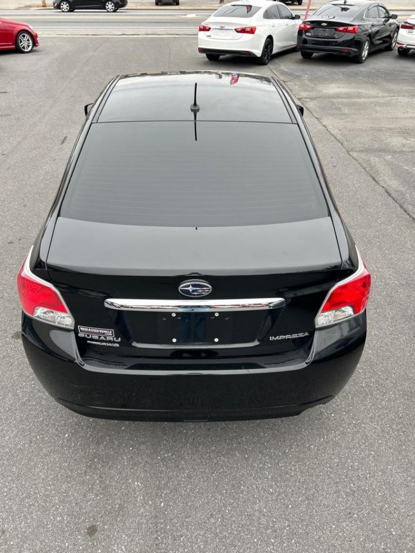 2012 BLACK SUBARU IMPREZA LIMITED (JF1GJAG67CH) with an 2.0L engine, Continuously Variable transmission, located at 2514 Williamson Rd NE, Roanoke, VA, 24012, (540) 265-7770, 37.294636, -79.936249 - NO CREDIT CHECK FINANCING WITH ONLY $2200 DOWN PAYMENT!!!! Check out our website www.needausedvehicle.com for our No Credit Check/ In House Financing options!! No Credit Check Available!!! In House Financing Available!!! All Clean Title Vehicles (no Salvaged or flooded vehicles ever on our lot)! - Photo#11