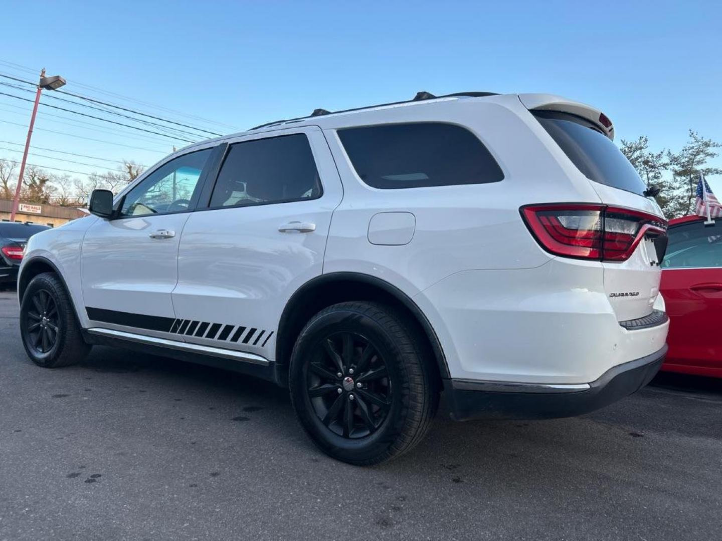 2014 WHITE DODGE DURANGO LIMITED (1C4RDJDG7EC) with an 3.6L engine, Automatic transmission, located at 2514 Williamson Rd NE, Roanoke, VA, 24012, (540) 265-7770, 37.294636, -79.936249 - NO CREDIT CHECK FINANCING WITH ONLY $4000 DOWN PAYMENT!!!! Check out our website www.needausedvehicle.com for our No Credit Check/ In House Financing options!! No Credit Check Available!!! In House Financing Available!!! All Clean Title Vehicles (no Salvaged or flooded vehicles ever on our lot)! - Photo#1