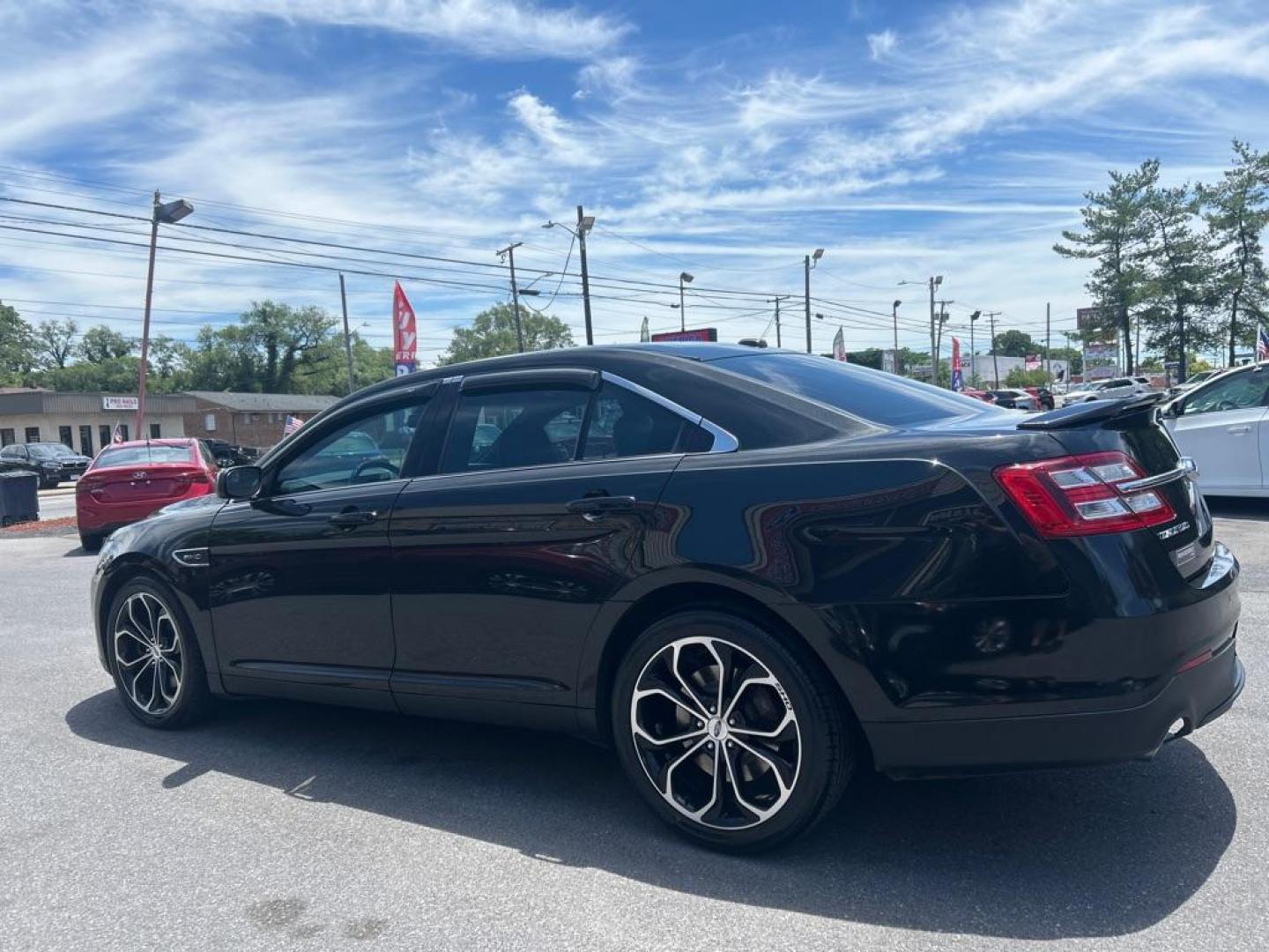 2015 BLACK FORD TAURUS SHO (1FAHP2KT0FG) with an 3.5L engine, Automatic transmission, located at 2514 Williamson Rd NE, Roanoke, VA, 24012, (540) 265-7770, 37.294636, -79.936249 - NO CREDIT CHECK FINANCING WITH ONLY $3800 DOWN PAYMENT!!!! Check out our website www.needausedvehicle.com for our No Credit Check/ In House Financing options!! No Credit Check Available!!! In House Financing Available!!! All Clean Title Vehicles (no Salvaged or flooded vehicles ever on our lot)!- Photo#1