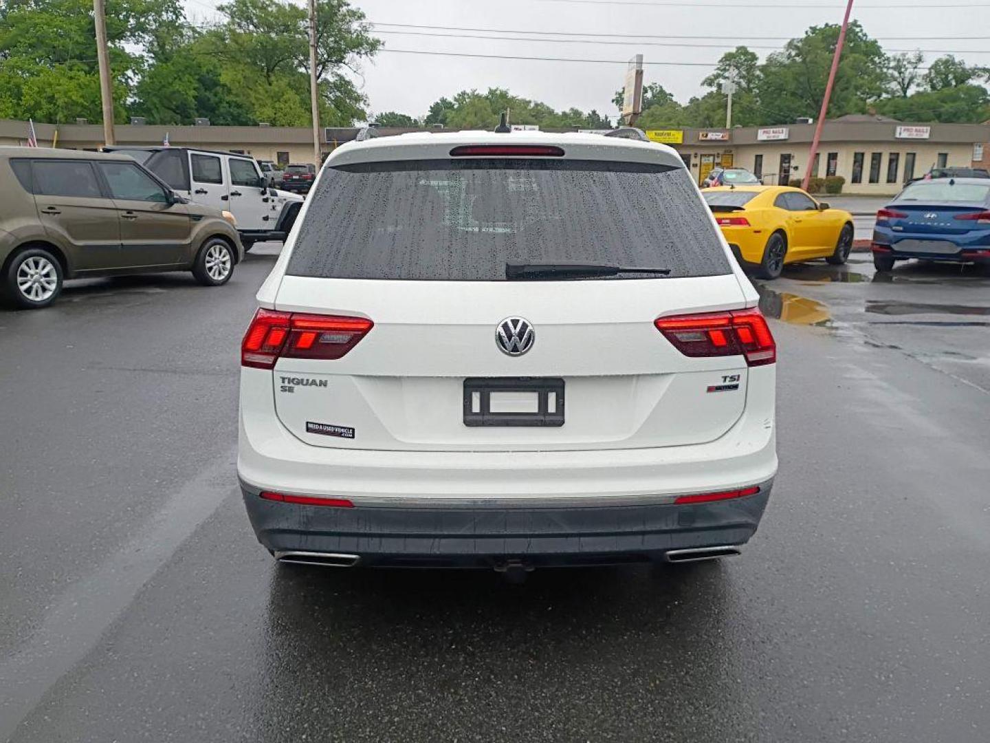 2018 WHITE VOLKSWAGEN TIGUAN SE (3VV2B7AX9JM) with an 2.0L engine, Automatic transmission, located at 2514 Williamson Rd NE, Roanoke, VA, 24012, (540) 265-7770, 37.294636, -79.936249 - NO CREDIT CHECK FINANCING WITH ONLY $3800 DOWN PAYMENT!!!! Check out our website www.needausedvehicle.com for our No Credit Check/ In House Financing options!! No Credit Check Available!!! In House Financing Available!!! All Clean Title Vehicles (no Salvaged or flooded vehicles ever on our lot)! - Photo#5
