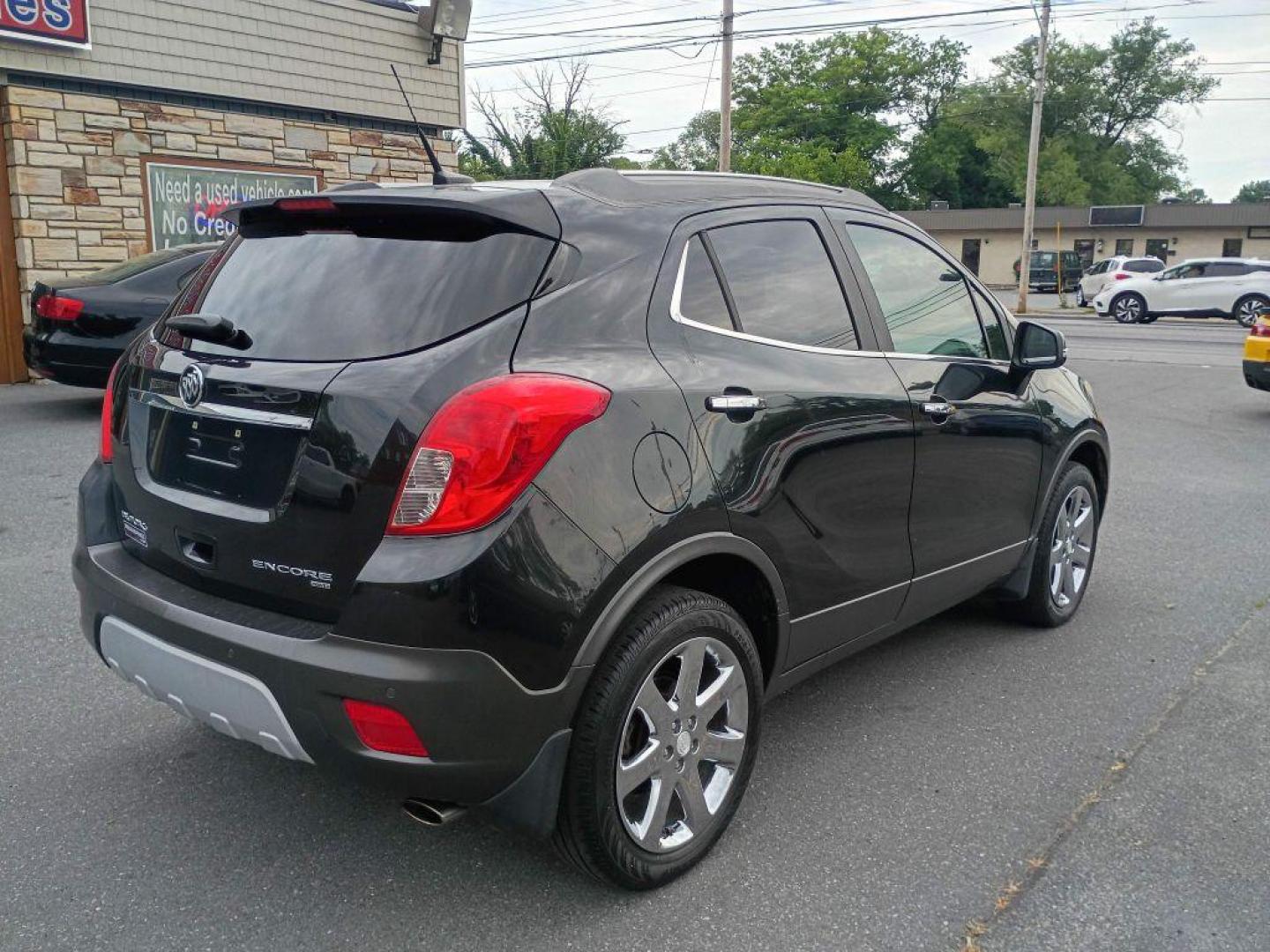 2014 BLACK BUICK ENCORE PREMIUM (KL4CJHSBXEB) with an 1.4L engine, Automatic transmission, located at 2514 Williamson Rd NE, Roanoke, VA, 24012, (540) 265-7770, 37.294636, -79.936249 - NO CREDIT CHECK FINANCING WITH ONLY $3000 DOWN PAYMENT!!!! Check out our website www.needausedvehicle.com for our No Credit Check/ In House Financing options!! No Credit Check Available!!! In House Financing Available!!! All Clean Title Vehicles (no Salvaged or flooded vehicles ever on our lot)! - Photo#6