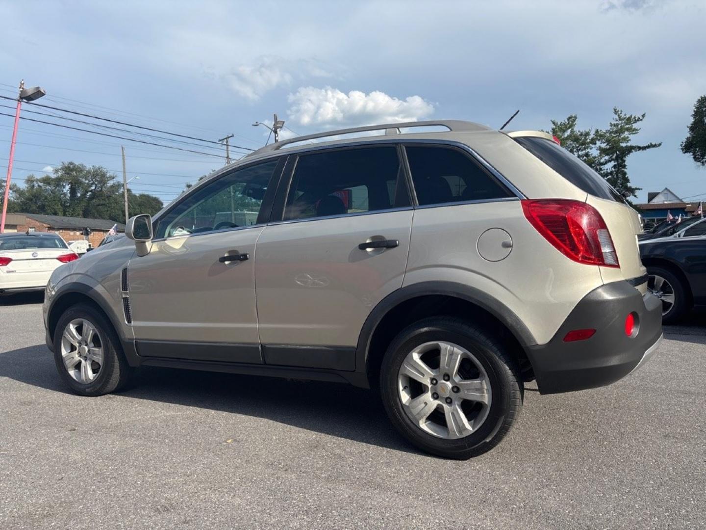 2014 GOLD CHEVROLET CAPTIVA LS (3GNAL2EK3ES) with an 2.4L engine, Automatic transmission, located at 2514 Williamson Rd NE, Roanoke, VA, 24012, (540) 265-7770, 37.294636, -79.936249 - NO CREDIT CHECK FINANCING WITH ONLY $1800 DOWN PAYMENT!!!! Check out our website www.needausedvehicle.com for our No Credit Check/ In House Financing options!! No Credit Check Available!!! In House Financing Available!!! All Clean Title Vehicles (no Salvaged or flooded vehicles ever on our lot)!- Photo#1