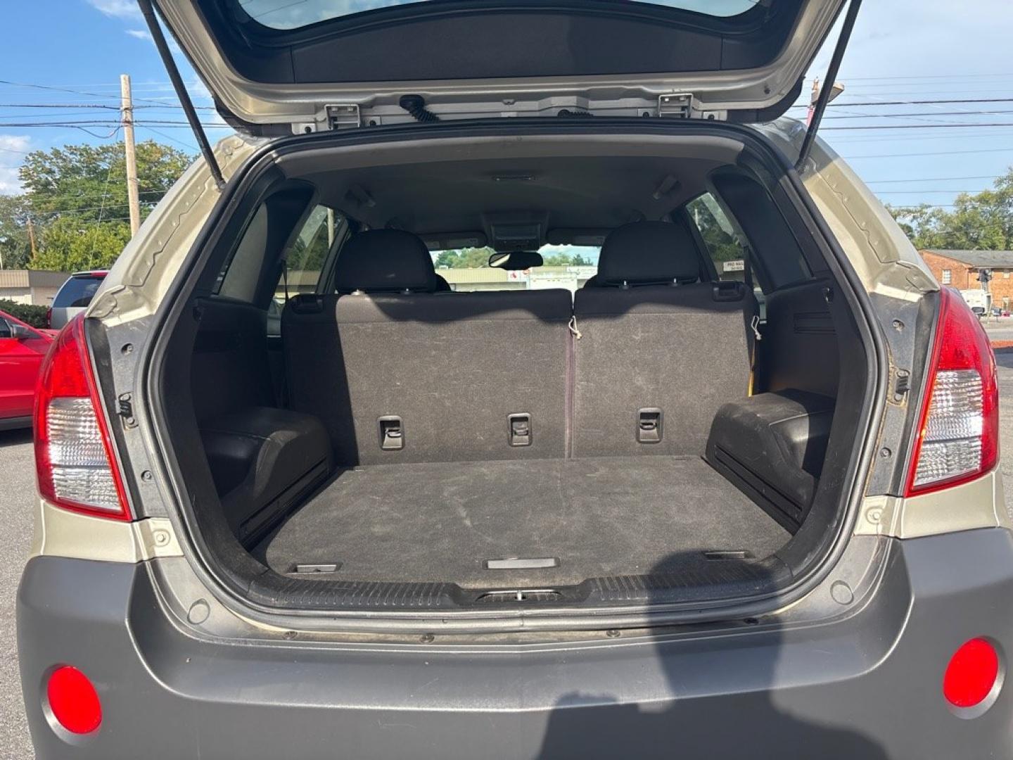 2014 GOLD CHEVROLET CAPTIVA LS (3GNAL2EK3ES) with an 2.4L engine, Automatic transmission, located at 2514 Williamson Rd NE, Roanoke, VA, 24012, (540) 265-7770, 37.294636, -79.936249 - NO CREDIT CHECK FINANCING WITH ONLY $1800 DOWN PAYMENT!!!! Check out our website www.needausedvehicle.com for our No Credit Check/ In House Financing options!! No Credit Check Available!!! In House Financing Available!!! All Clean Title Vehicles (no Salvaged or flooded vehicles ever on our lot)!- Photo#2