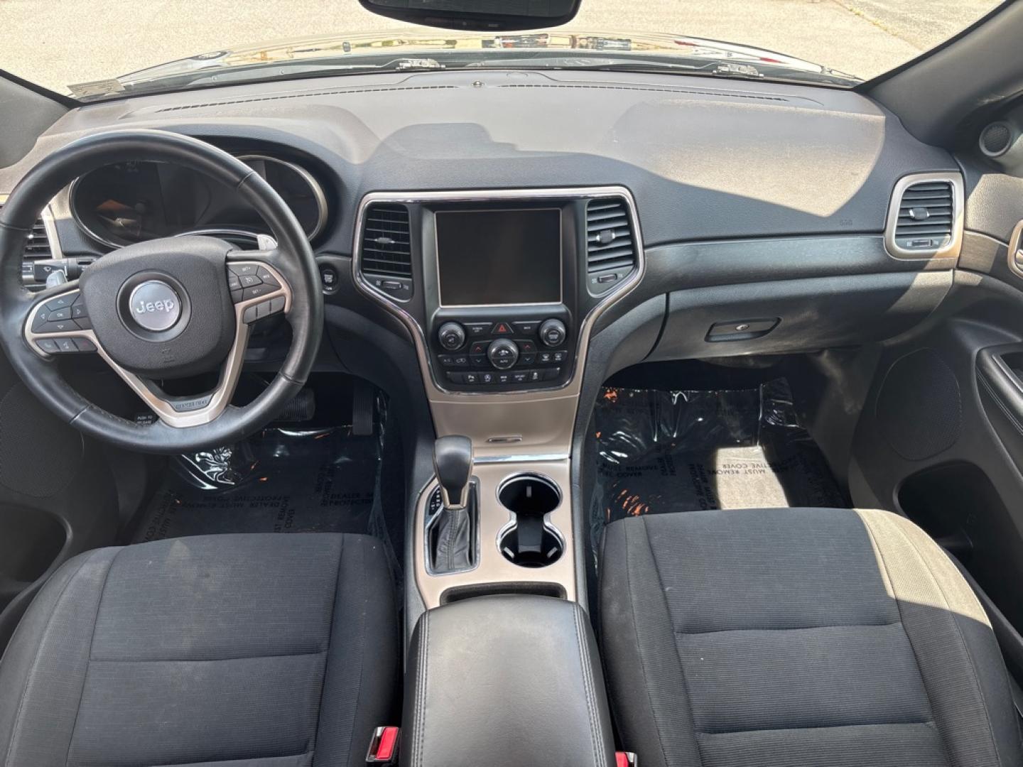 2017 BLACK JEEP GRAND CHEROKEE LAREDO (1C4RJFAG4HC) with an 3.6L engine, Automatic transmission, located at 2514 Williamson Rd NE, Roanoke, VA, 24012, (540) 265-7770, 37.294636, -79.936249- Photo#7